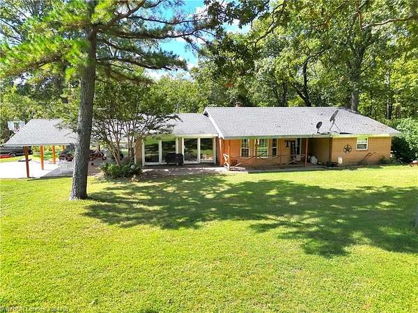 8 Acres of Residential Land with Home for Sale in Bunch, Oklahoma