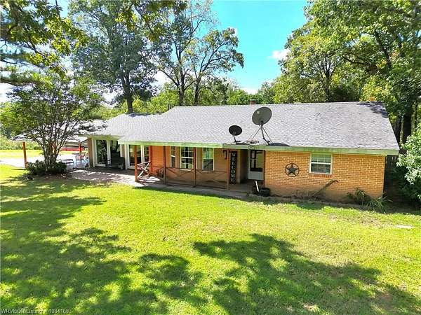 8 Acres of Residential Land with Home for Sale in Bunch, Oklahoma