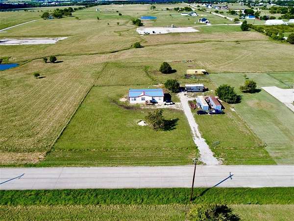 2 Acres of Residential Land with Home for Sale in Ponder, Texas