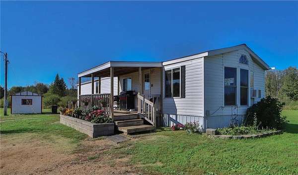 4.5 Acres of Residential Land with Home for Sale in Palisade, Minnesota