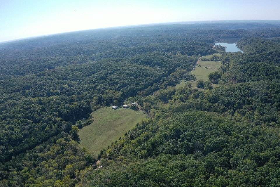 79 Acres of Land with Home for Sale in Gravois Mills, Missouri
