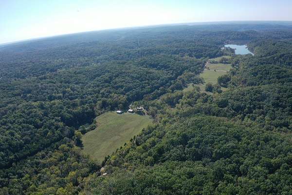 79 Acres of Land with Home for Sale in Gravois Mills, Missouri
