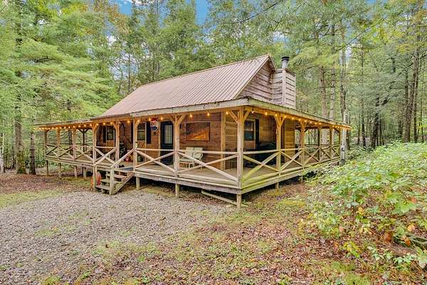 10 Acres of Residential Land with Home for Sale in Crab Orchard, Tennessee