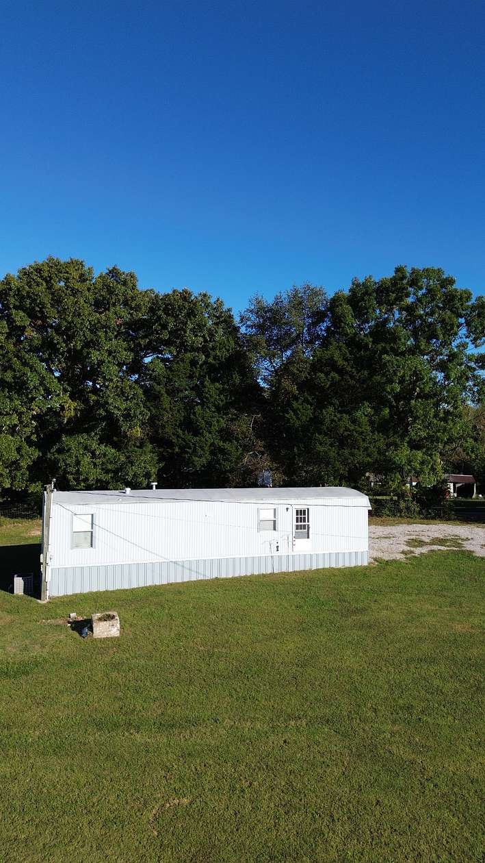 5 Acres of Land with Home for Sale in Smithville, Tennessee