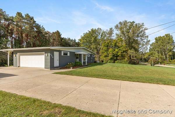 2.57 Acres of Residential Land with Home for Sale in Sparta, Michigan