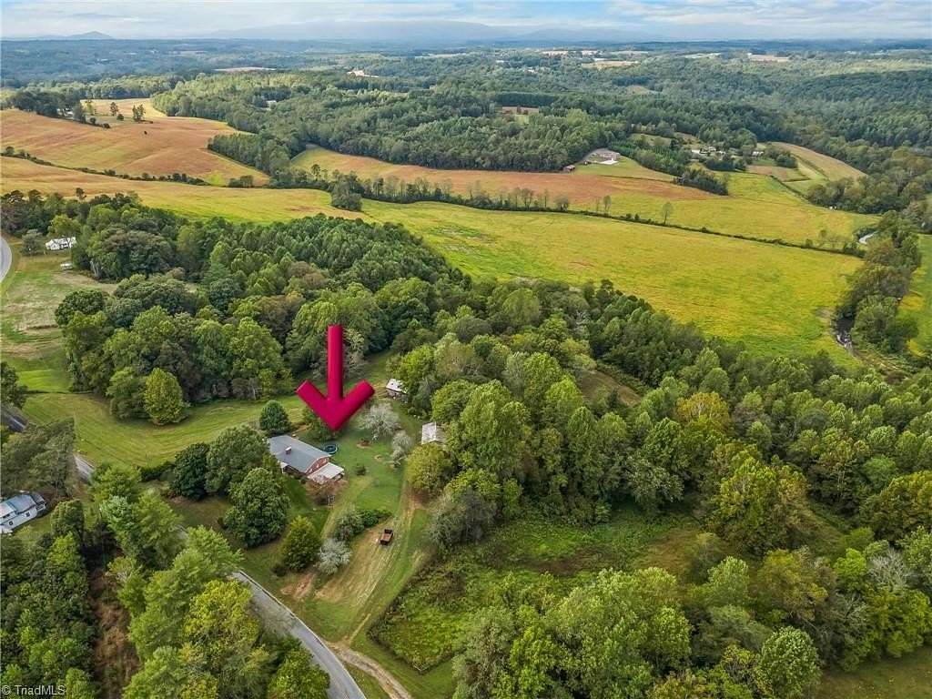 20.7 Acres of Agricultural Land with Home for Sale in Elkin, North Carolina