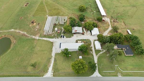 345 Acres of Agricultural Land with Home for Sale in Reeds, Missouri