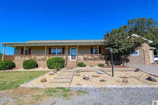 20.9 Acres of Land with Home for Sale in Tiline, Kentucky