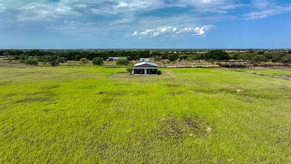 9.8 Acres of Land with Home for Sale in Millsap, Texas