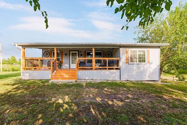 4.88 Acres of Residential Land with Home for Sale in Bonner Springs, Kansas