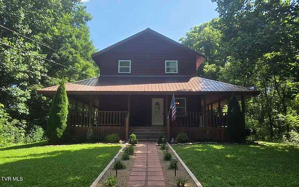 3.35 Acres of Land with Home for Sale in Roan Mountain, Tennessee