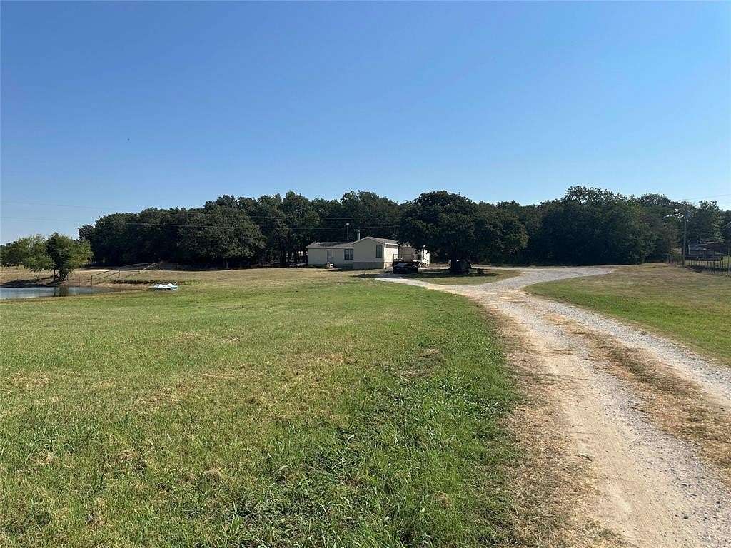 3.29 Acres of Residential Land with Home for Sale in Gainesville, Texas
