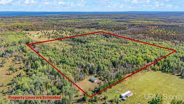 40 Acres of Recreational Land with Home for Sale in Rapid River, Michigan
