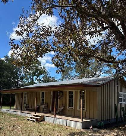 1.61 Acres of Residential Land with Home for Sale in Spurger, Texas