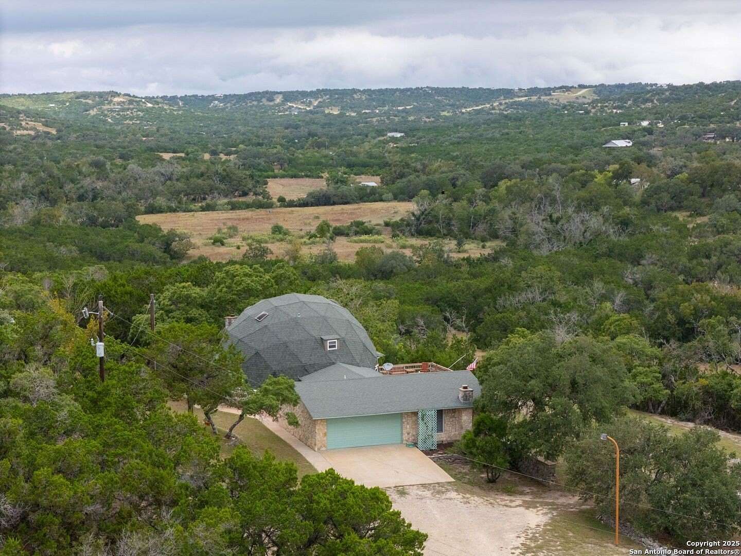 5.45 Acres of Residential Land with Home for Sale in Blanco, Texas