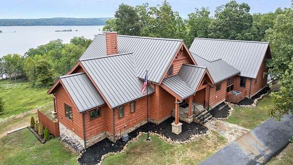 3.47 Acres of Residential Land with Home for Sale in Big Sandy, Tennessee