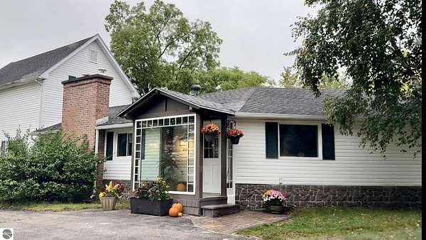 1.63 Acres of Residential Land with Home for Sale in Traverse City, Michigan