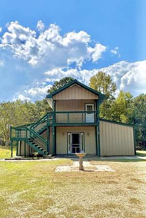 5.5 Acres of Land with Home for Sale in Carriere, Mississippi
