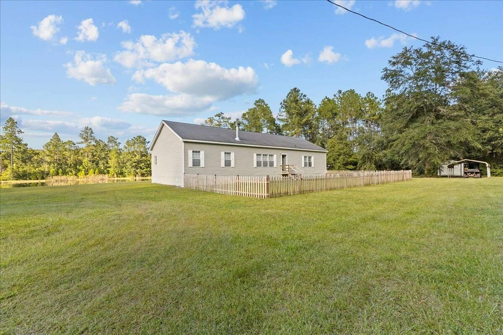 5 Acres of Land with Home for Sale in Woodbine, Georgia