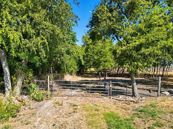 13.6 Acres of Recreational & Residential Land for Sale in Wolfe City, Texas