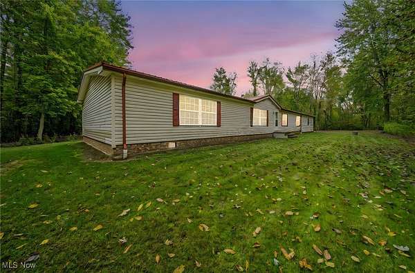 6.13 Acres of Residential Land with Home for Sale in Rome, Ohio