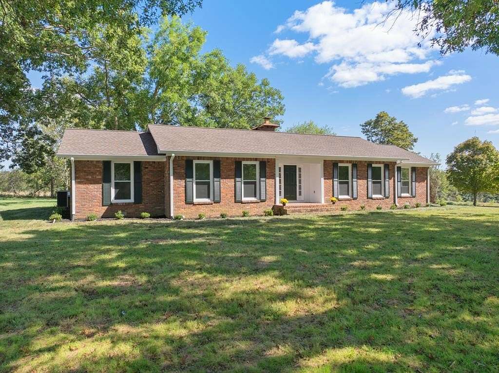 3.2 Acres of Land with Home for Sale in Holladay, Tennessee