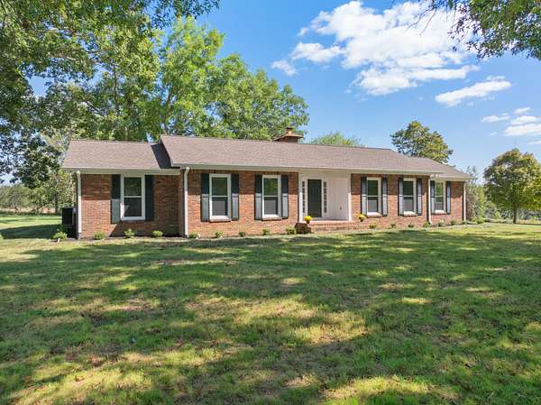3.2 Acres of Land with Home for Sale in Holladay, Tennessee