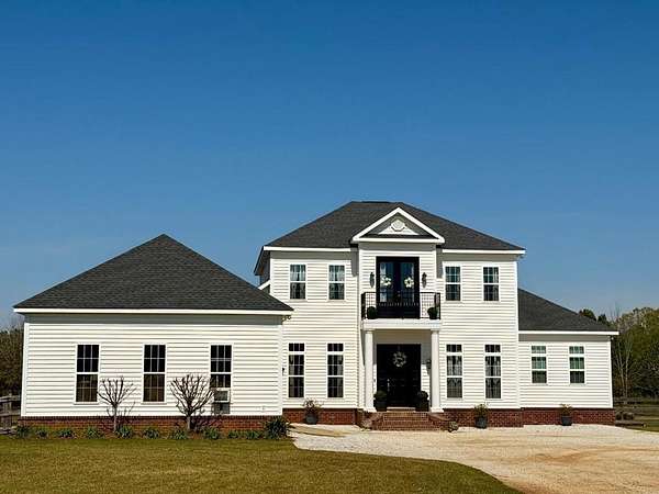 10.4 Acres of Land with Home for Sale in Newton, Alabama