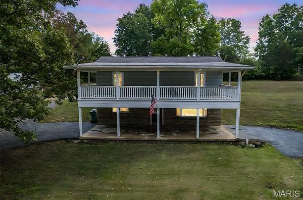 2.2 Acres of Residential Land with Home for Sale in De Soto, Missouri