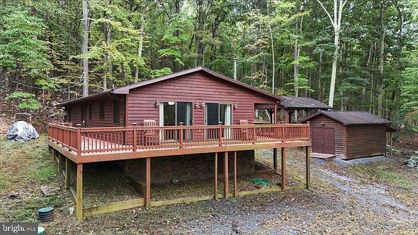 3 Acres of Residential Land with Home for Sale in Great Cacapon, West Virginia