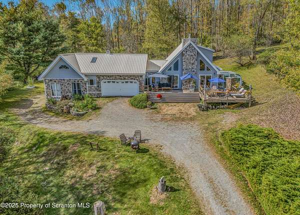 6.7 Acres of Residential Land with Home for Sale in Hop Bottom, Pennsylvania