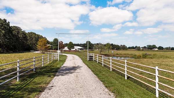 48.7 Acres of Agricultural Land with Home for Sale in Fordland, Missouri