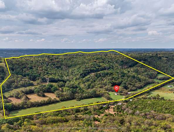 265 Acres of Land with Home for Sale in Dellrose, Tennessee