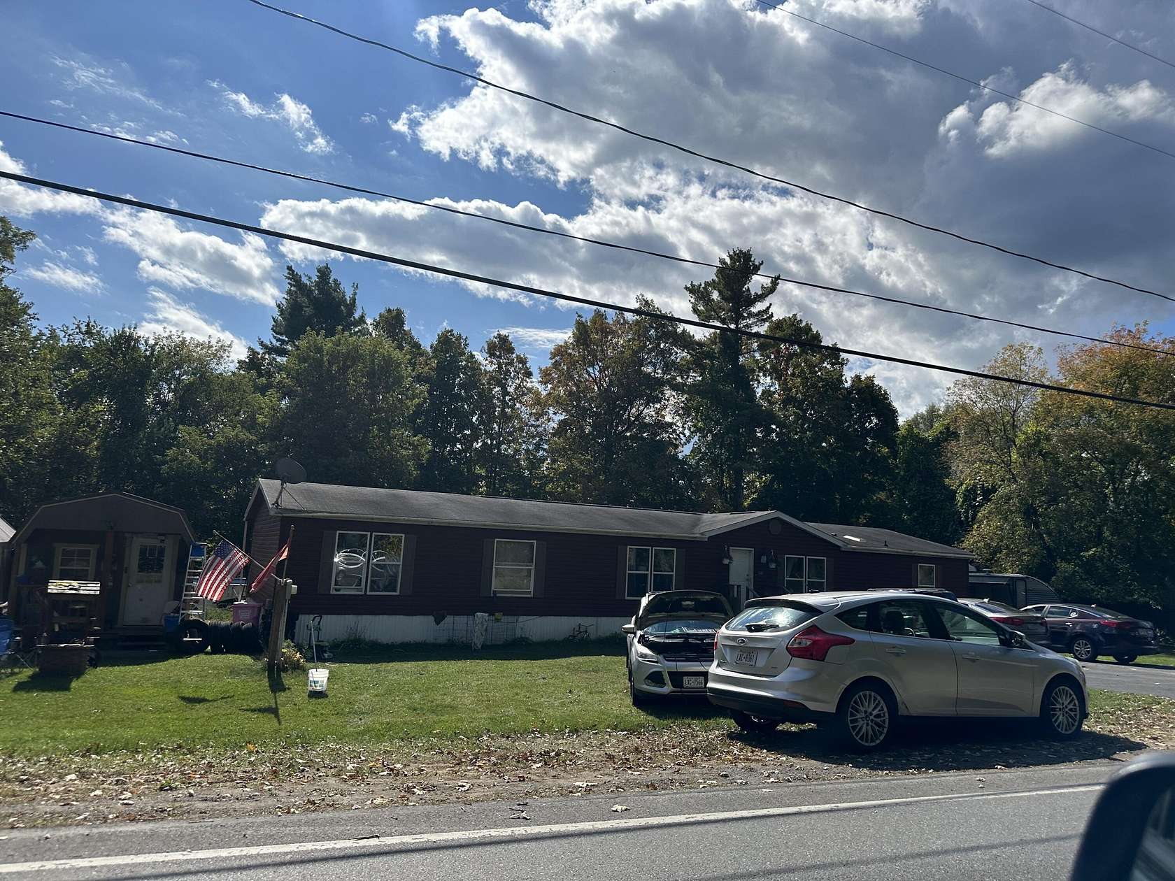 0.9 Acres of Residential Land with Home for Auction in Plattsburgh, New York