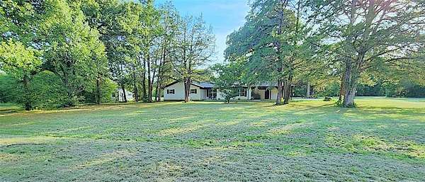 3.85 Acres of Residential Land with Home for Sale in Streetman, Texas