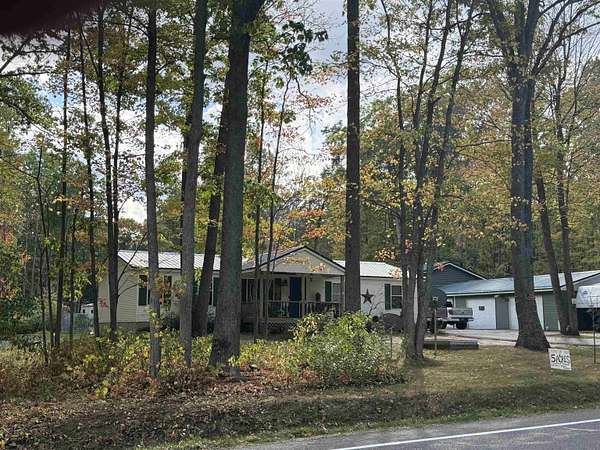 5 Acres of Residential Land with Home for Sale in Prudenville, Michigan