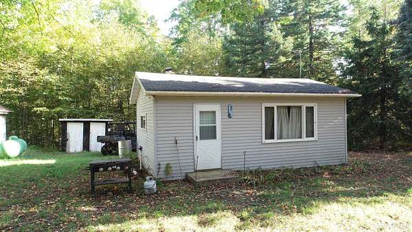 5 Acres of Residential Land with Home for Sale in Hermansville, Michigan