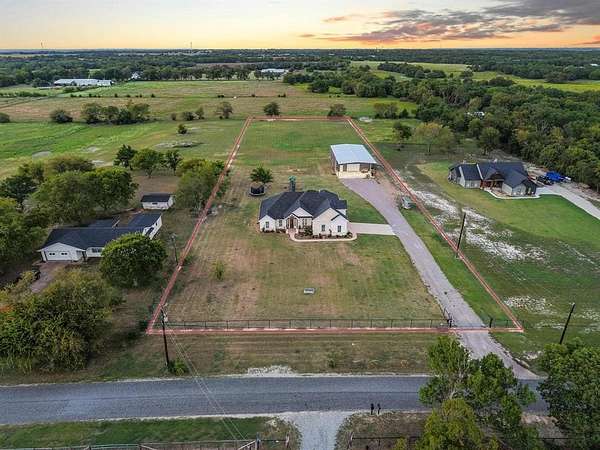 2.6 Acres of Residential Land with Home for Sale in Whitewright, Texas