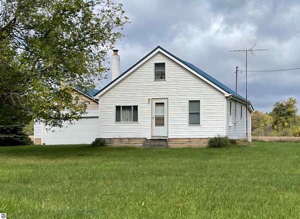 2.5 Acres of Residential Land with Home for Sale in Prescott, Michigan