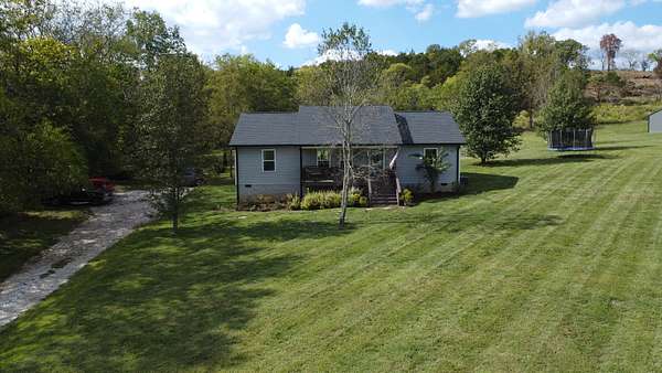 5.23 Acres of Residential Land with Home for Sale in Hartsville, Tennessee