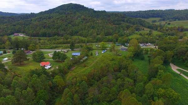 34.6 Acres of Land with Home for Sale in Rockholds, Kentucky
