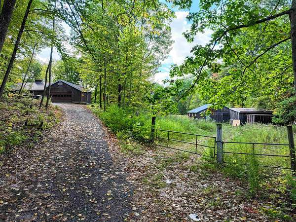 38.3 Acres of Agricultural Land with Home for Sale in Middlebury, Vermont