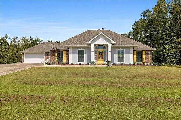 5.85 Acres of Residential Land with Home for Sale in Maurepas, Louisiana