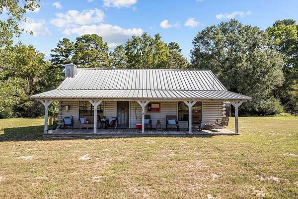 125 Acres of Land with Home for Sale in Kennard, Texas