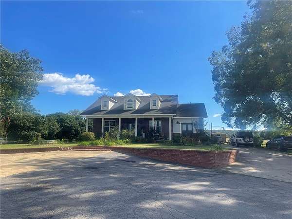 4.4 Acres of Land with Home for Sale in Clarksville, Arkansas