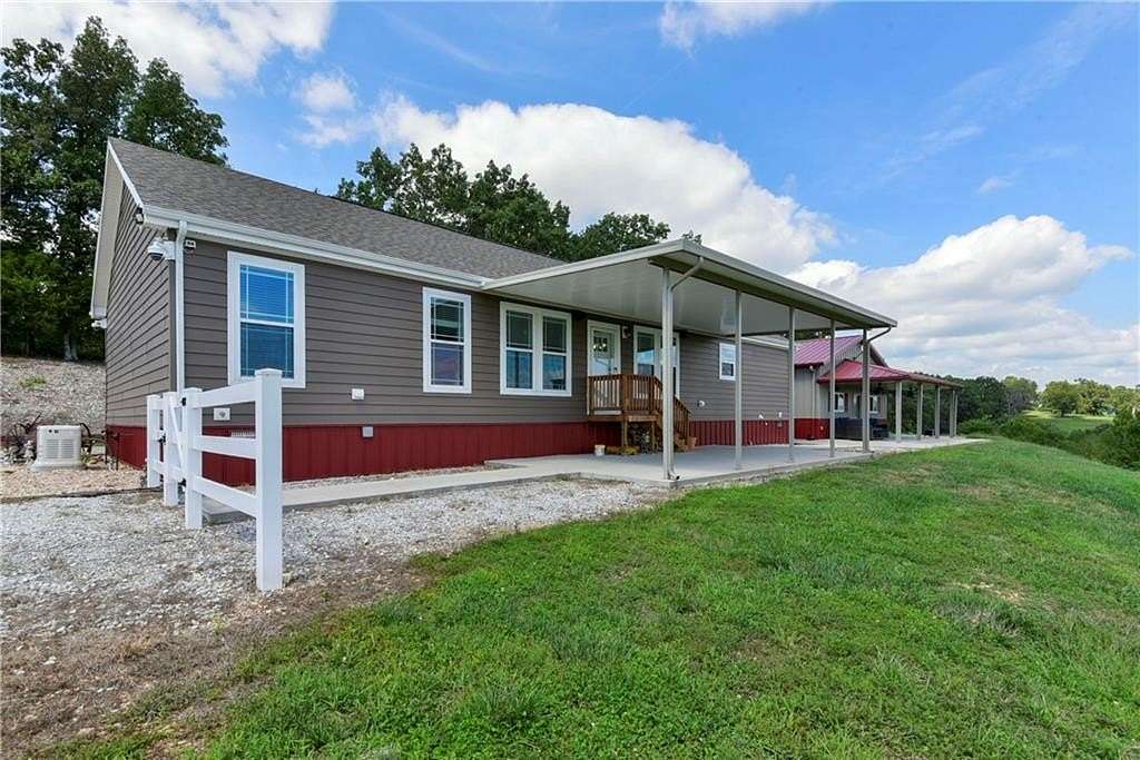 5.17 Acres of Residential Land with Home for Sale in Eagle Rock, Missouri