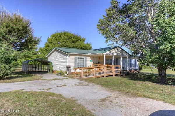 4 Acres of Residential Land with Home for Sale in Webb City, Missouri