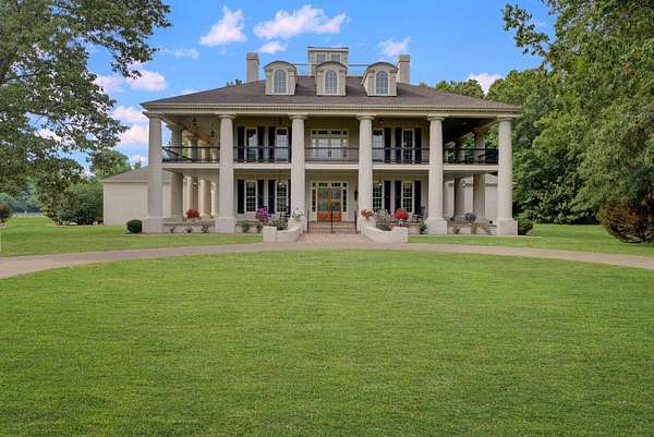 14.2 Acres of Land with Home for Auction in Jackson, Tennessee