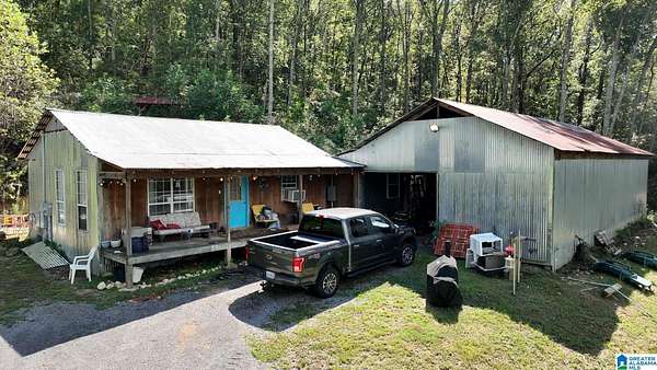 21.8 Acres of Land with Home for Sale in Springville, Alabama