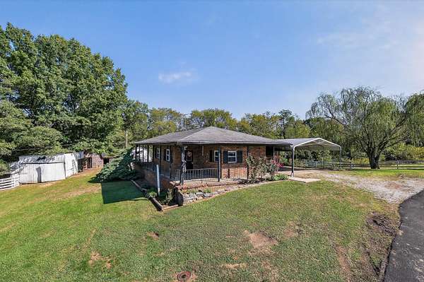 5.16 Acres of Land with Home for Sale in Melbourne, Kentucky